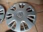 Preview: OPEL Corsa D 4x Radzierblende Radkappe 15 Zoll 13214814