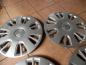 Preview: OPEL Corsa D 4x Radzierblende Radkappe 15 Zoll 13214814