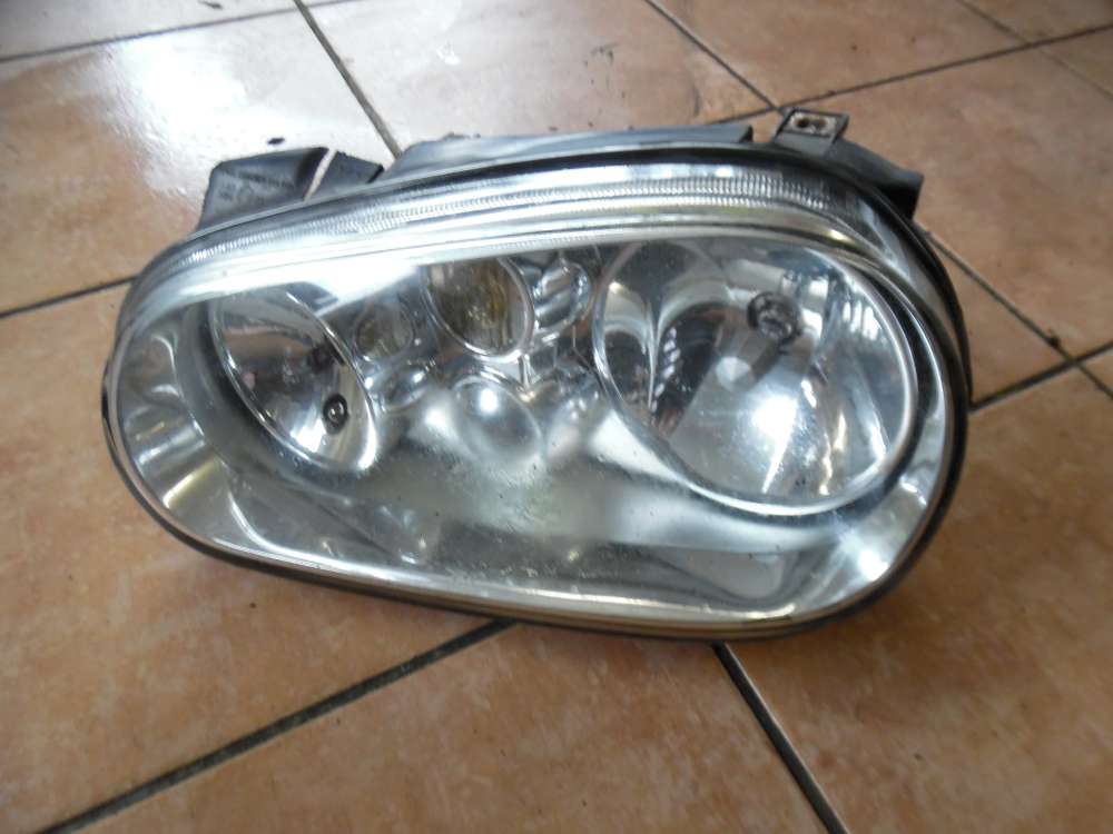 VW Golf IV Scheinwerfer Frontscheinwerfer Links 1J1941015