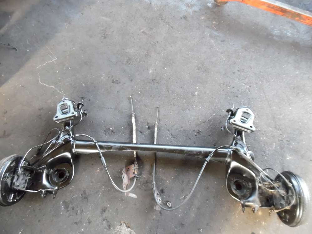 Fiat Punto 199 Achsträger Hinterachse mit Handbremsseil 55704108